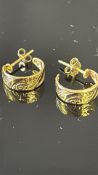 Pair of 9ct gold hoop earrings Weight 1.3g
