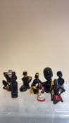 Group of 9 ceramic blackamoor and souvenir figural ornaments