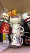 Collection of novelty advertising and commemorative ceramic mugs