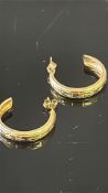 Pair of 9ct gold earrings Weight 1.2g