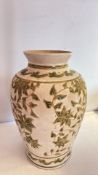 Earthenware vase with green foliate decoration