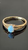 9ct Gold ring set with opal solitaire Weight 1.7g