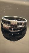 9ct White Gold ring set with black stones Weight