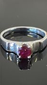 9ct white gold ring claw-set with a single round 0.50 ct ruby, tapered shank, accompanied by Gems TV