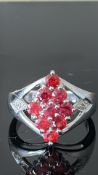 9ct Gold ring set with red stones & diamond Weigh