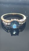 9ct Gold ring set with blue gemstone & diamond