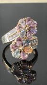9ct Gold ring set with multicolour sapphire & diam