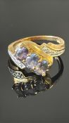 9ct Gold ring set with tanzanite & diamonds Weigh