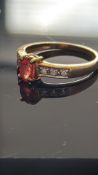 9ct Gold ring set with fire opal & diamond Weight