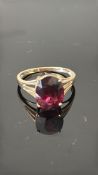 9ct Gold ring set with garnet solitaire Weight 2.