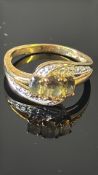 9ct Gold ring set with yellow gem stones & diamond