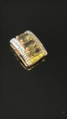 9ct Gold pendant set with yellow stones & diamond