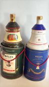 Two Bell's porcelain whisky decanters with presentation tins