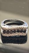 9ctWhite Gold ring set with diamond & dark gem sto