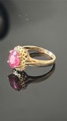 9ct Gold ring set with red stone Weight 3.5g