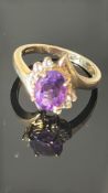 9ct Gold ring set with amethyst & diamond Weight