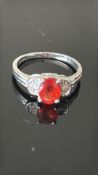 9ct White Gold ring set with red gem stones & diam