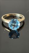 9ct Gold ring set with blue topaz solitaire ring W
