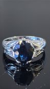 18k white gold ring, claw-set with an oval royal sapphire (approx 10 x 8 mm, 2.225 ct), pierced