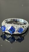 9ct Gold ring set with blue & white stones Weight
