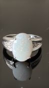 9ct White Gold ring set with opal & diamonds Weigh
