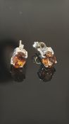 Pair of 9ct white gold earring set with citrine We