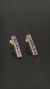 Pair of 9ct gold earring set with amethyst Weight
