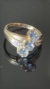 9ct Gold ring set with 3 blue stones & diamonds