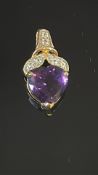 9ct Gold pendant set with amethyst & diamond Weigh