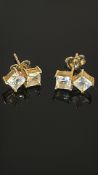 Pair of 9ct gold earring set with Cubic zirconia