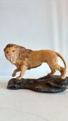 Beswick Lion on a rock