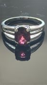 9ct White Gold ring set with oval red garnet Weigh