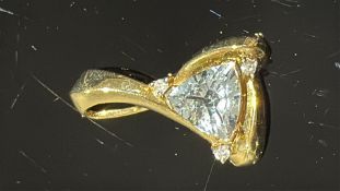 18ct Gold pendant set with blue topaz Weight 4.1g