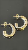 Pair of 9ct gold dual colour earrings Weight 1.9g