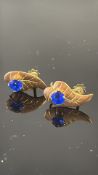 Pair of 9ct gold earrings set with blue sapphire W