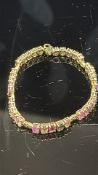 10ct Gold bracelet set with various gem stones Wei