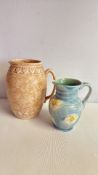 Pair of Beswick and Arthur Wood pottery jugs