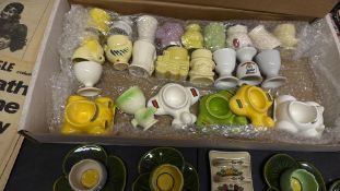 Collection of novelty ceramic egg cups and breakfa