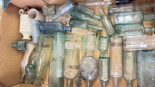 Box of antique aqua glass bottles