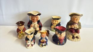 Group of 8 Staffordshire Toby character jugs