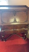 Carved oak fall-front bureau