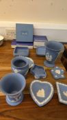 Collection of Wedgwood blue jasperware vases and trinket dishes