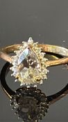 9ct Gold ring central possible citrine surrounded