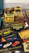 Collection of boxed die-cast model vehicles by Corgi, Matchbox, Lledo and others