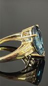 9ct Gold ring set with large blue stone with bague