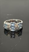 9ct White Gold ring set with blue topaz & diamonds