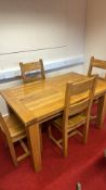 Oak dining table and four chairs