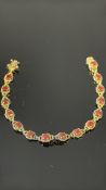 Silver 14ct Gold plated bracelet set with fire opa