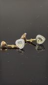 Pair of 18ct gold earrings set with 0.235ct diamon