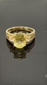 9ct Gold ring set with yellow gemstones & white st